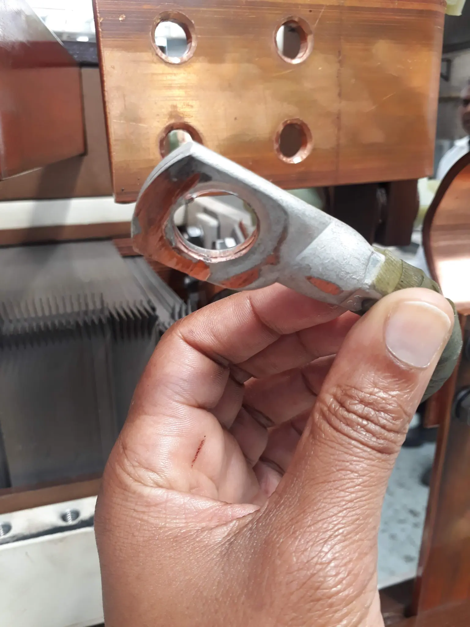 Close inspection of transformer connection hardware